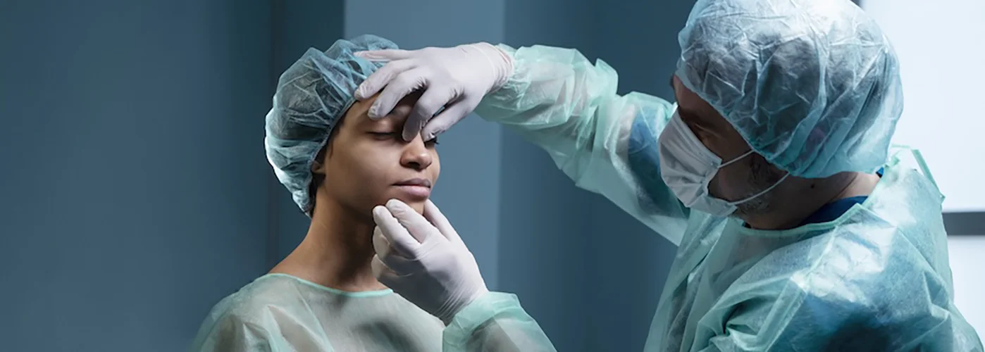 doctor checking sinus patient after surgery